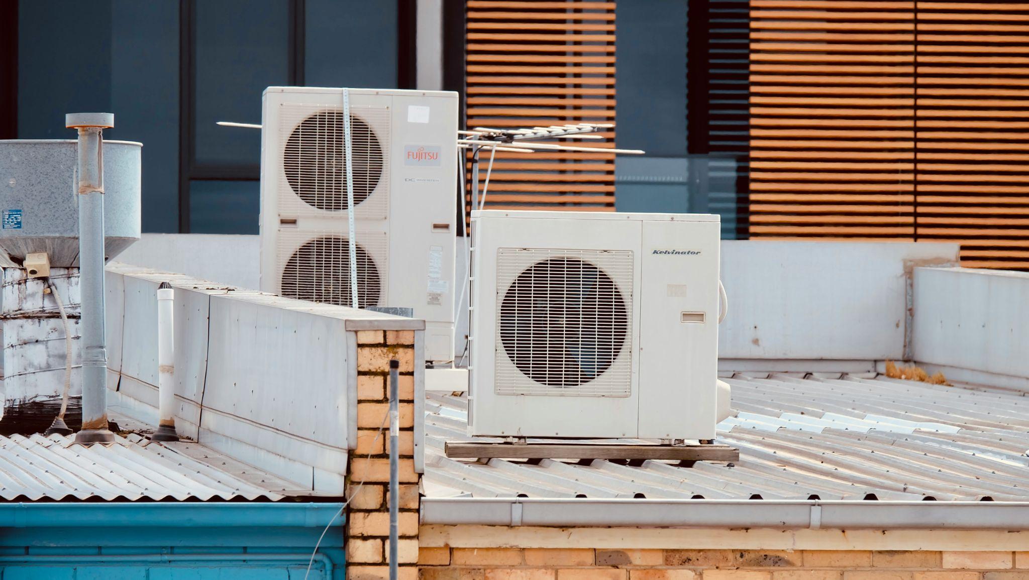 Outdoor HVAC units installed on a rooftop highlight equipment used in HVAC installation services in Fresno.